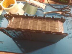 Wrapping the cells with tape for stability