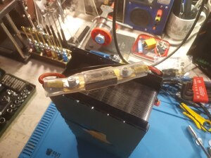 Fuse connected with heat shrink tubing